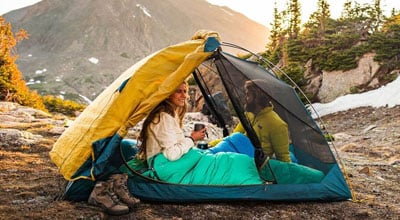 Couple in small backpacking tent